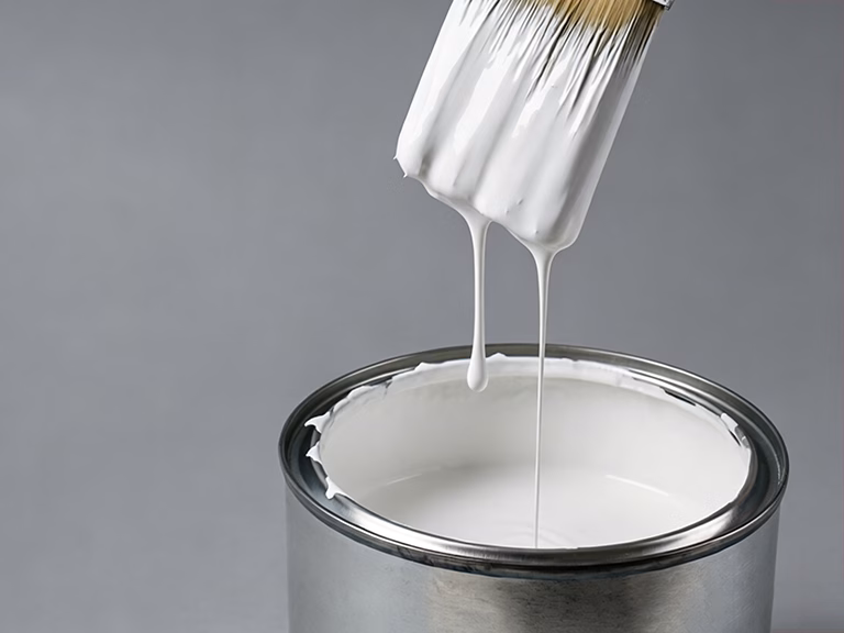 White aerogel coating material being poured
